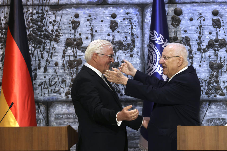 Israeli President Reuven Rivlin and German President Frank-Walter Steinmeier greet each other at the President's residence in Jerusalem, Thursday, July 1, 2021. (AP Photo/Tsafrir Avayov)