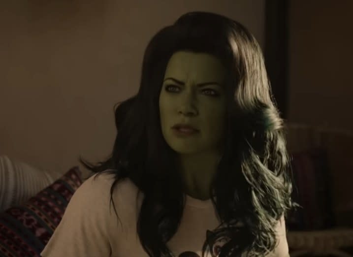 She Hulk being woken up and angrily looking at the Hulk