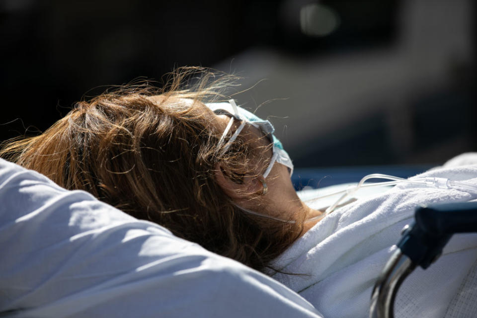 A COVID-19 patient arrives to the Montefiore Medical Centre Moses Campus in the Bronx borough of New York City. 