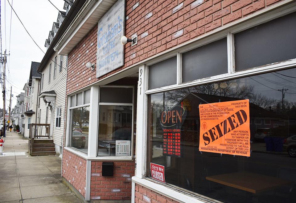 A notice from the State Department of Revenue is posted in the window at Graham's Hot Dogs, 931 Bedford St., Fall River.