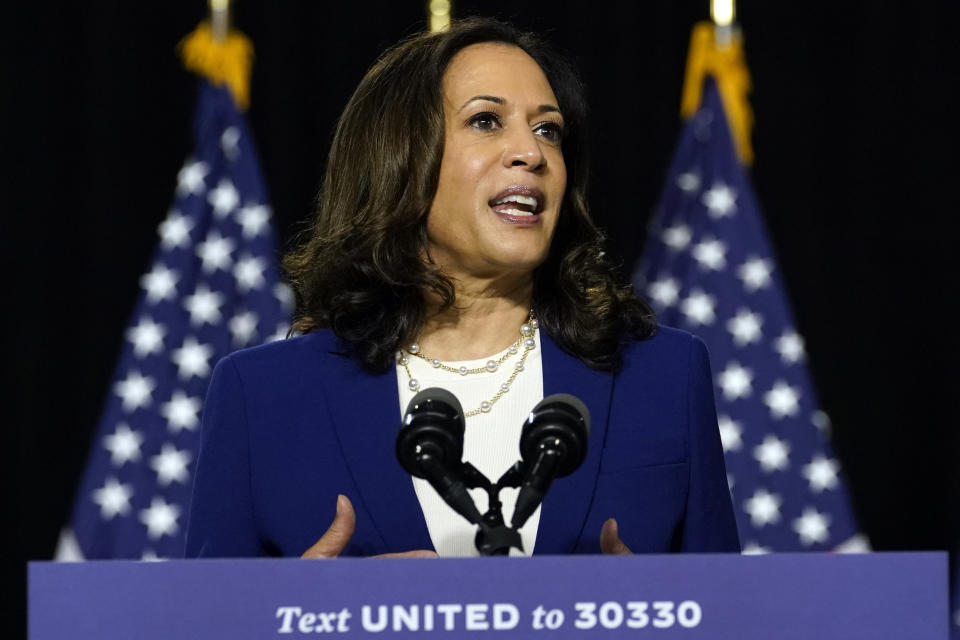 FILE - In this Aug. 12, 2020, file photo, Sen. Kamala Harris, D-Calif., speaks after Democratic presidential candidate former Vice President Joe Biden introduced her as his running mate during a campaign event at Alexis Dupont High School in Wilmington, Del. After following her career for years, Harris' extended family in Jamaica is elated at their relative’s rise to a historic nomination. (AP Photo/Carolyn Kaster, File)