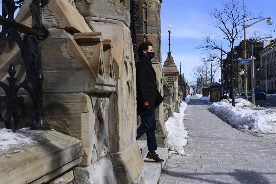 Canadian Prime Minister Justin Trudeau makes his way to hold a press conference during the coronavirus pandemic in Ottawa, Ontario, Friday, March 5, 2021. (Sean Kilpatrick/The Canadian Press via AP)