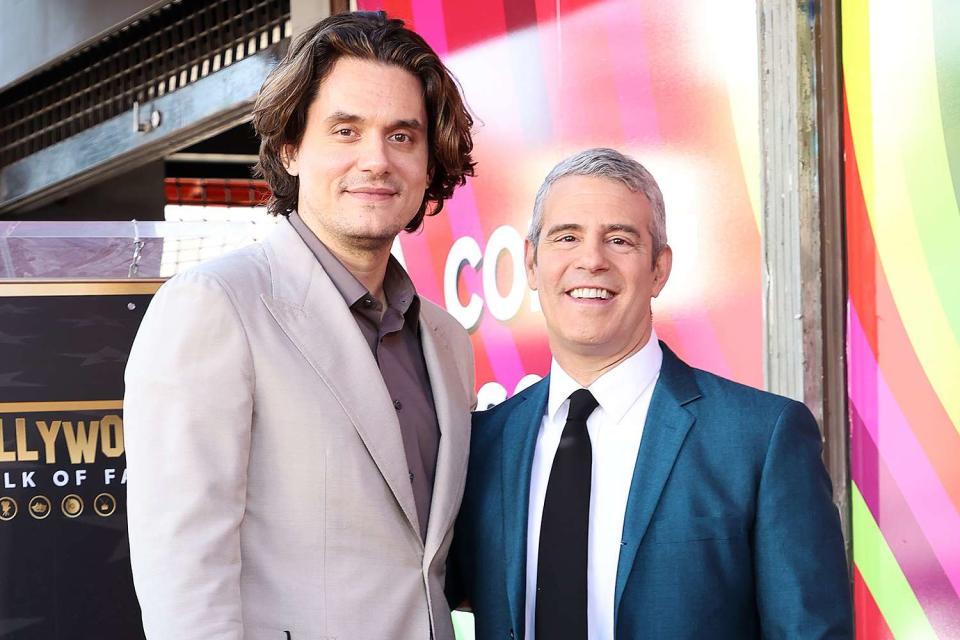 <p>Amy Sussman/Getty</p> From left: John Mayer and Andy Cohen attend the Hollywood Walk of Fame Star Ceremony for Andy Cohen on February 4, 2022 in Hollywood, California.