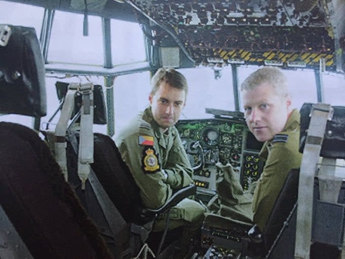 Scott (right) on the flight deck during his first tour on 47 Squadron. Note the unique tricolor flag on the flight suit of the pilot on the left. <em>via Scott Bateman</em>