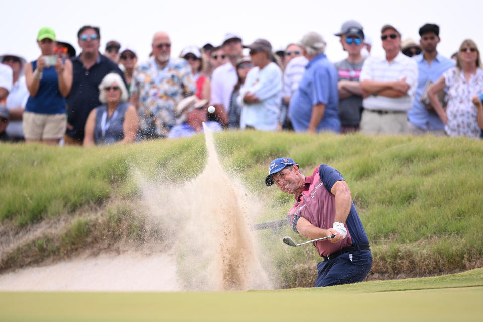 Harrington hits a shot from the bunker