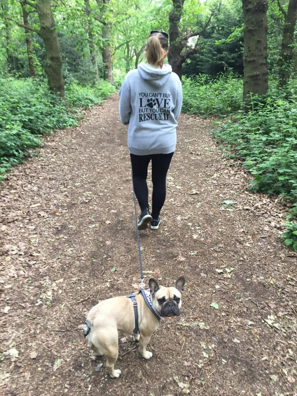 Kirsty Hunt, 36, with French bulldog Harper, 4, on a walk (Collect/PA Real Life)