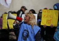 A woman participates in a protest against the government’s economic measures in Buenos Aires