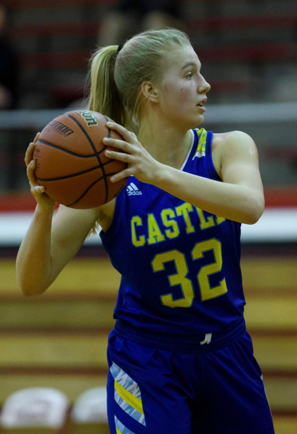 Castle’s Natalie Niehaus (32) looks to make a pass during the IHSAA Class 4A sectional championship against the North Huskies at Harrison High School in Evansville, Ind., Saturday, Feb. 6, 2021.