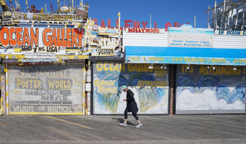 Man jogs as coronavirus disease (COVID-19) restrictions are eased at Ocean City, Maryland