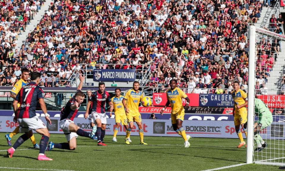 Lewis Ferguson (third from left) scores during the Serie A match between Bologna and Calcio at Renato Dall’Ara stadium in Bologna, Italy