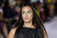 Irina Shayk wears a creation for the Versace Spring Summer 2022 collection during Milan Fashion Week, in Milan, Italy, Friday, Sept. 24, 2021. (AP Photo/Luca Bruno)