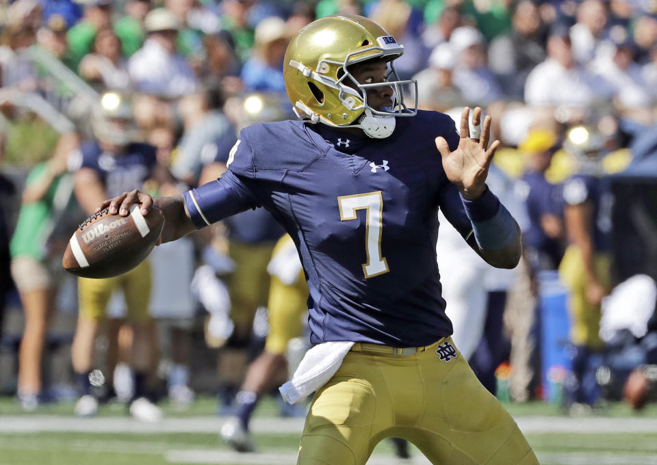 FILE - In this Sept. 15, 2018, file photo, Notre Dame quarterback Brandon Wimbush looks to throw against Vanderbilt during the first half of an NCAA college football game in South Bend, Ind. Two people familiar with the decision say No. 3 Notre Dame will start quarterback Brandon Wimbush against Florida State on Saturday for Ian Book, who is nursing an undisclosed injury. The people spoke Thursday, Nov. 8, 2018, to The Associated Press on condition of anonymity to because no official announcement was forthcoming. Notre Dame coach Brian Kelly had a scheduled news conference later Thursday. (AP Photo/Nam Y. Huh, File)
