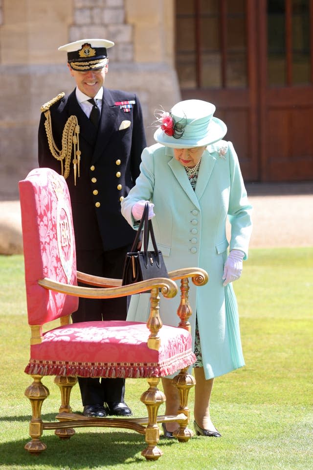 Captain Sir Thomas Moore receives his knighthood