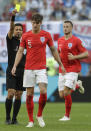 <p>England’s John Stones, center, is shown a yellow card by referee Alireza Faghani of Iran during the third place match between England and Belgium at the 2018 soccer World Cup in the St. Petersburg Stadium in St. Petersburg, Russia, Saturday, July 14, 2018. (AP Photo/Petr David Josek) </p>