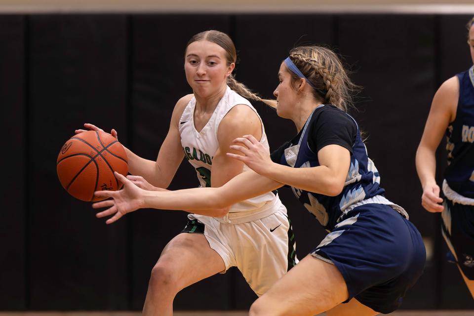 Mogadore's Brook McIntyre runs with the ball during a high school basketball game against Rootstown, Wednesday, Feb. 7, 2024, in Mogadore, Ohio.