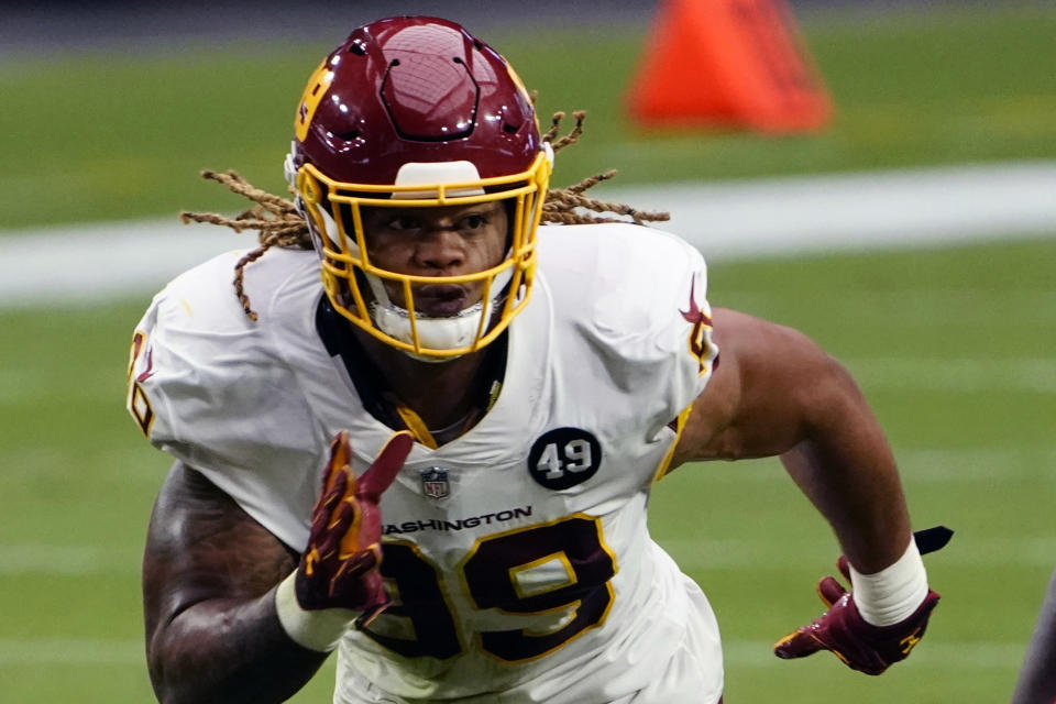 Washington Football Team defensive end Chase Young (99) is shown during an NFL football game against the Arizona Cardinals, Sunday, Sept. 20, 2020, in Glendale, Ariz. The last time Baker Mayfield faced a talented, quarterback-seeking defensive line anchored by the No. 2 overall draft pick, things didn't go well. The San Francisco 49ers menaced and mauled Mayfield last season. On Sunday the Browns' QB faces Washington's ferocious front.(AP Photo/Rick Scuteri, File)