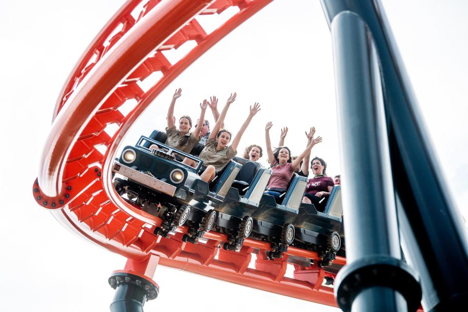 People ride Big Bear Mountain during the rollercoaster's grand opening in Dollywood's Wildwood Grove on Friday, May 12, 2023. 