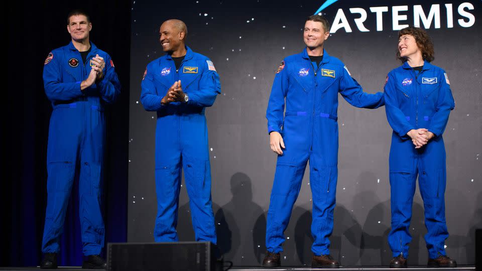 Astronauts Jeremy Hansen (from left), Victor Glover, Reid Wiseman and Christina Koch appear during an April 3, 2023, announcement event in Houston. The four were selected for the Artemis II mission, which is set for a lunar flyby in 2024. - Mark Felix/AFP/Getty Images