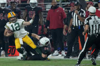 Green Bay Packers quarterback Aaron Rodgers looks for a call as Arizona Cardinals defensive end Zach Allen (94) makes the tackle during the second half of an NFL football game, Thursday, Oct. 28, 2021, in Glendale, Ariz. The Packers won 24-21. (AP Photo/Rick Scuteri)