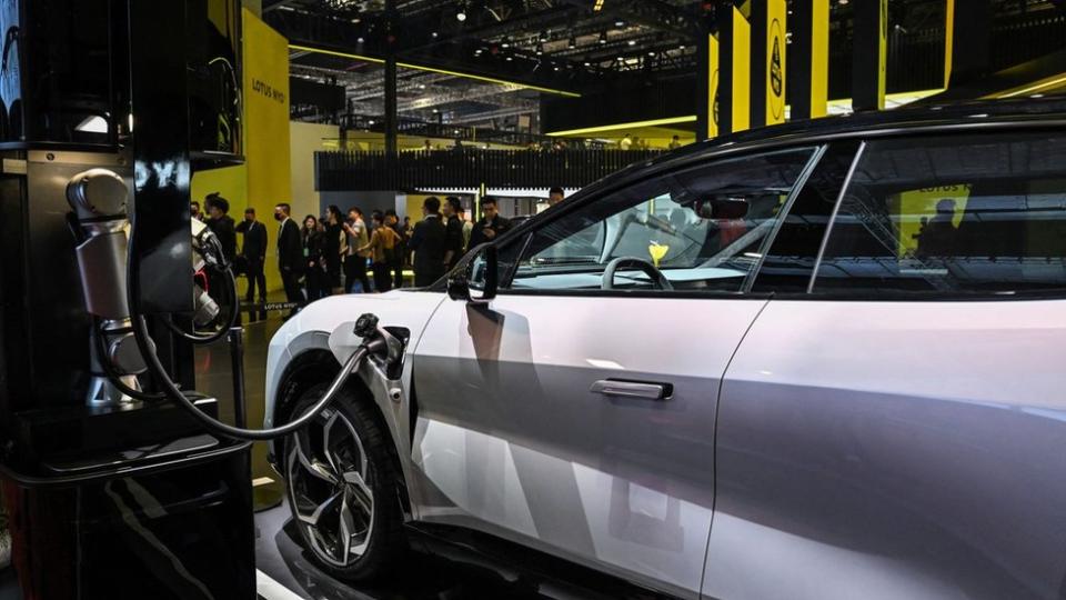 A Lotus Eletre is charged at the company's stand during the 20th Shanghai International Automobile Industry Exhibition in Shanghai on April 18, 2023.