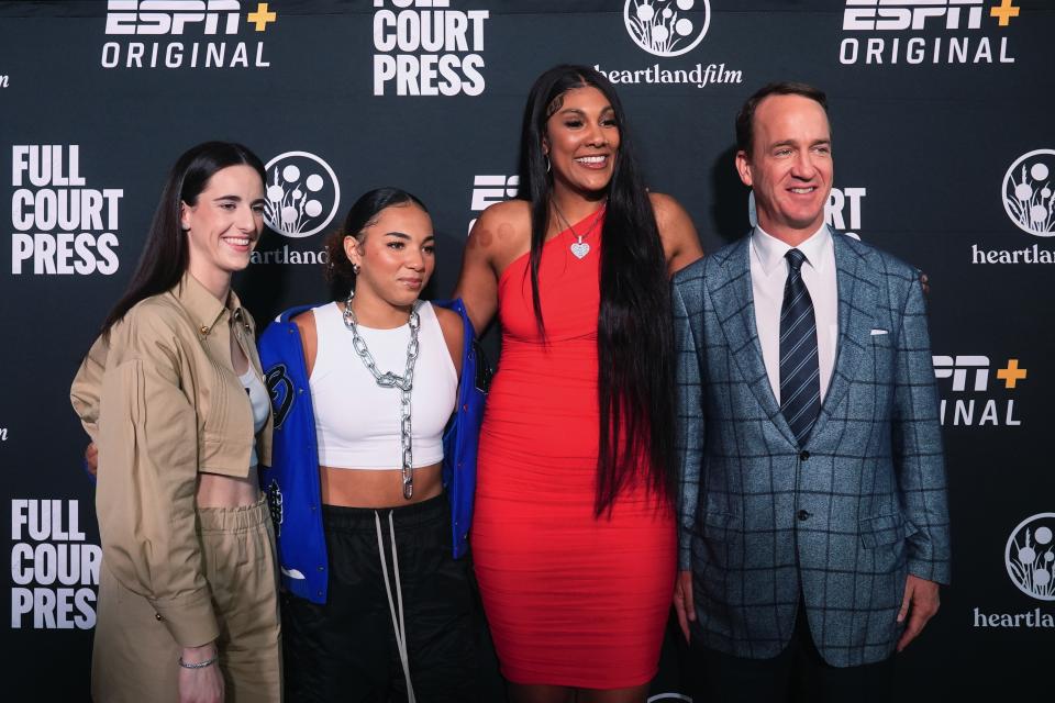 From left to right, Indiana Fever's Caitlin Clark, UCLA's Kiki Rice, Chicago Sky's Kamilla Cardoso and Peyton Manning arrive on the Red Carpet before the world premiere and screening of Episode 1 of the upcoming ESPN+ Original Series Full Court Press, Monday, May 6, 2024, in Indianapolis. (AP Photo/Darron Cummings)