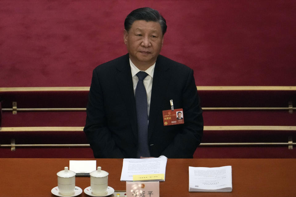 Chinese President Xi Jinping attends a session of China's National People's Congress (NPC) at the Great Hall of the People in Beijing, Tuesday, March 7, 2023. (AP Photo/Ng Han Guan)