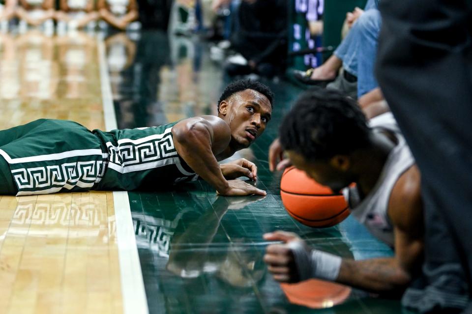 Michigan State's Tyson Walker looks up after going for a ball out of bounds against Penn State during the second half on Thursday, Jan. 4, 2024, in East Lansing.