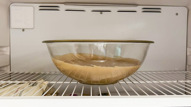 Cinnamon-cashew frosting in large bowl in freezer