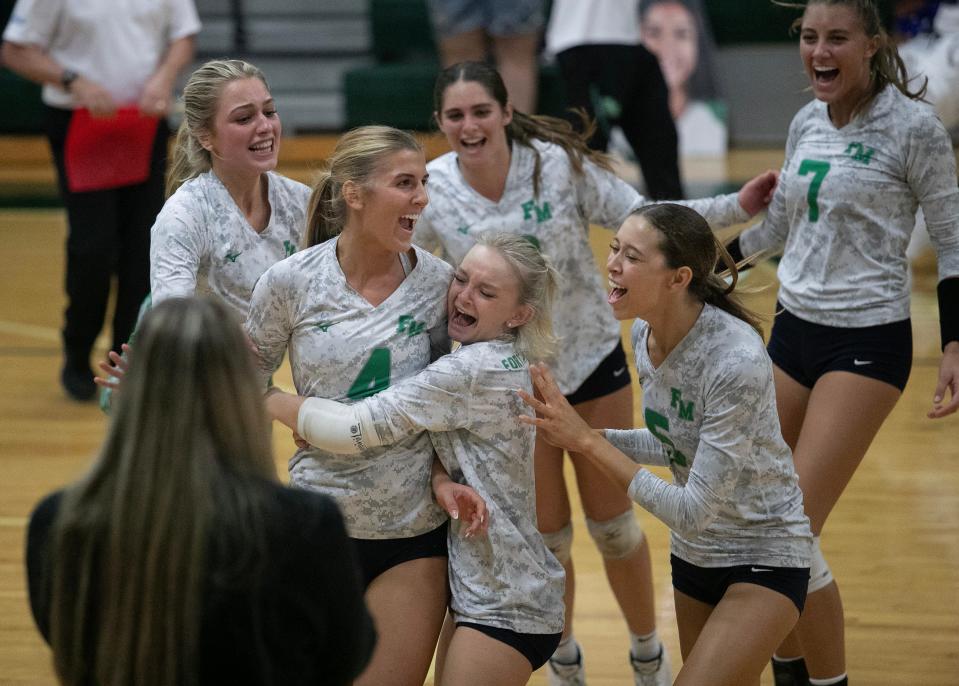 Fort Myers celebrates their 3-2 win over Tampa Wharton in the 6A Volleyball Regional Quarterfinals on Wednesday, Oct. 25, 2023, at Fort Myers High School.