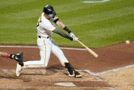 Pittsburgh Pirates' Kevin Newman doubles off Philadelphia Phillies starting pitcher Chase Anderson, driving in two runs, during the fifth inning of a baseball game in Pittsburgh, Friday, July 30, 2021. (AP Photo/Gene J. Puskar)