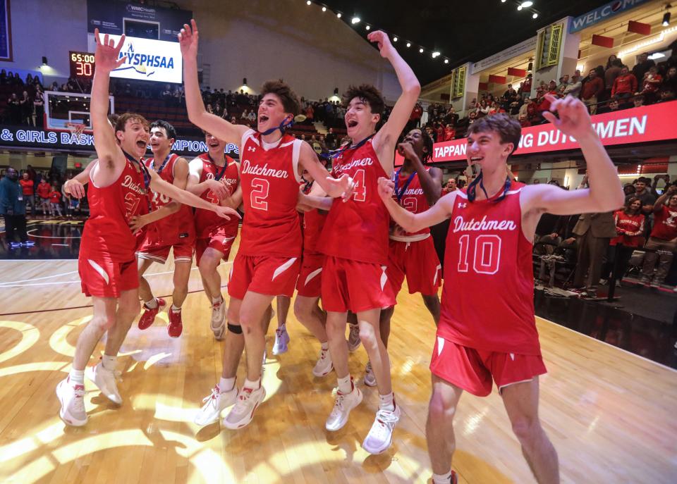 Tappan Zee celebrates after defeating Somers 39-15 to win the Section 1 Class A Boys Basketball championship at the Westchester County Center March 5, 2023. 