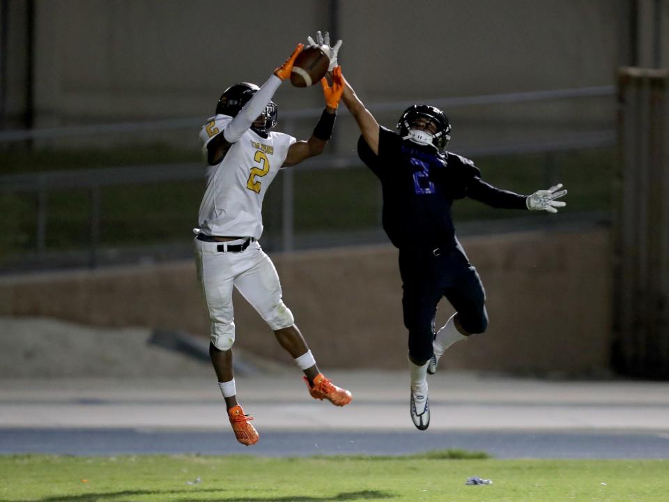 Malachi Harper (2) of Yucca Valley intercepts a pass intended for Javier Godinez (2) of Cathedral City in Cathedral City, Calif., on Sept. 15, 2023.