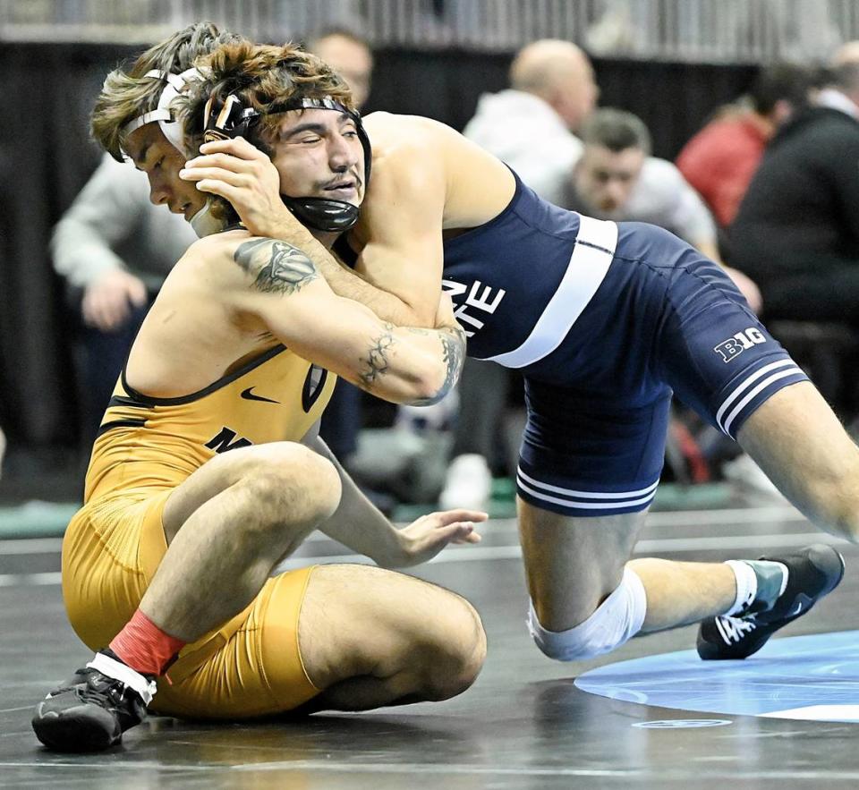 Penn State’s Aaron Nagao controls Missouri’s Kade Moore in their 133 pound first round consolation match of the NCAA Championships on Thursday, March 21, 2024 at the TMobile Center in Kansas City, Mo. Nagao defeated Moore, 16-1.