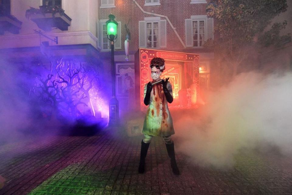 A scareactor awaits guests on opening night of 2021's Halloween Horror Nights at Universal Studios Hollywood.