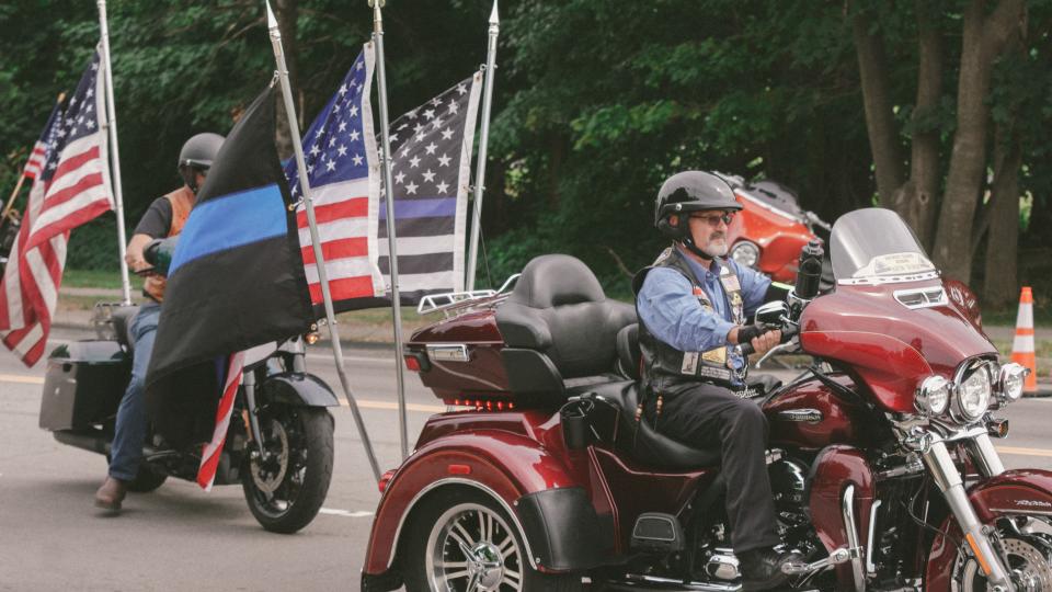 The Patriot Guard Riders leave after attending services for Rochester Police Officer Anthony Mazurkiewicz.