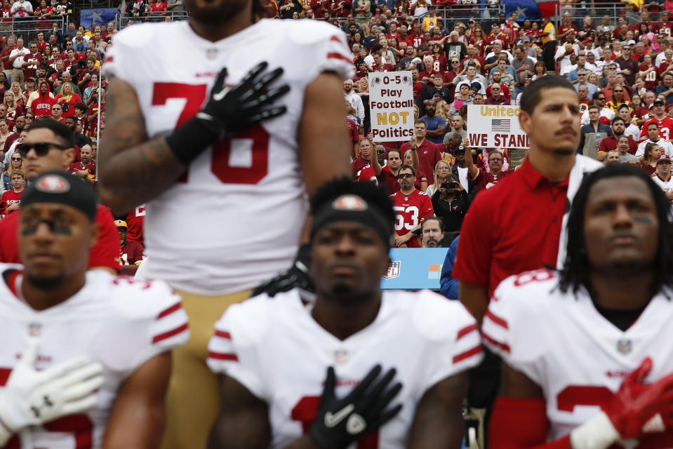 Some Niners protest racial inequality during a game to the chagrin of some Redskins fans. (AP)