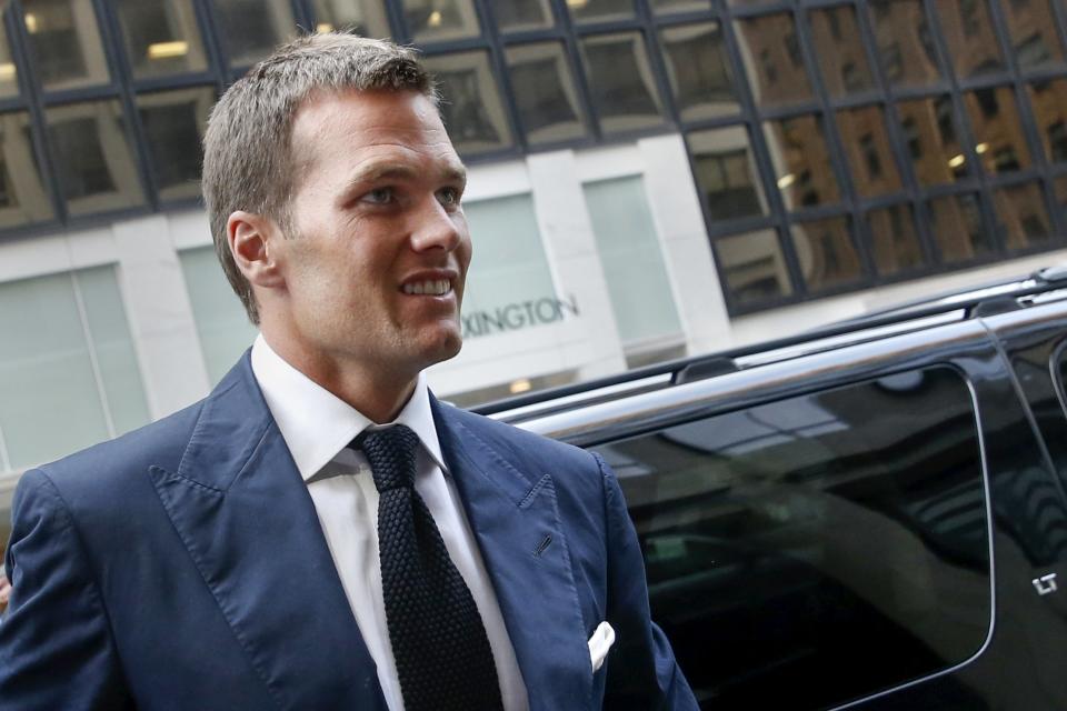 New England Patriot's quarterback Tom Brady arrives at NFL headquarters in New York June 23, 2015. Tom Brady's appeal of his four-game National Football League suspension for participating in a scheme to deflate footballs during last season's playoffs begins Tuesday at NFL headquarters in New York. REUTERS/Shannon Stapleton