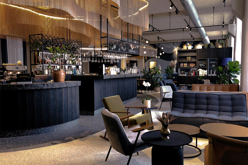 experiential brand design hotel bar with plush seating