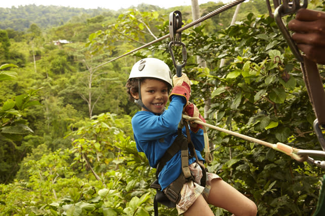 Mandatory Credit: Photo by Blend Images/REX/Shutterstock (4079242a)MODEL RELEASED Mixed Race Boy Zip Lining, Costa Rica, Costa Rica, Costa Rica VARIOUS