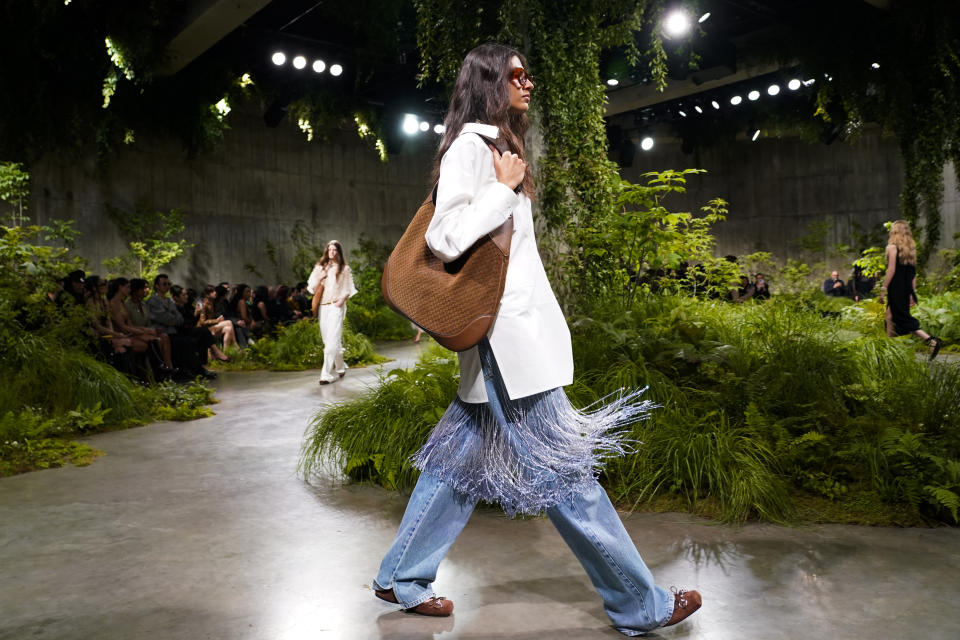 A model wears an outfit for the Gucci Cruise fashion show in London, Monday, May 13, 2024. (Photo by Alberto Pezzali/Invision/AP)