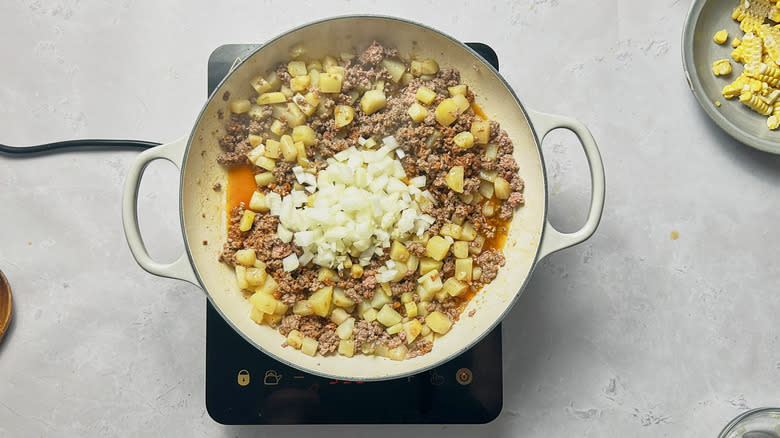 chorizo beef potato hash in skillet