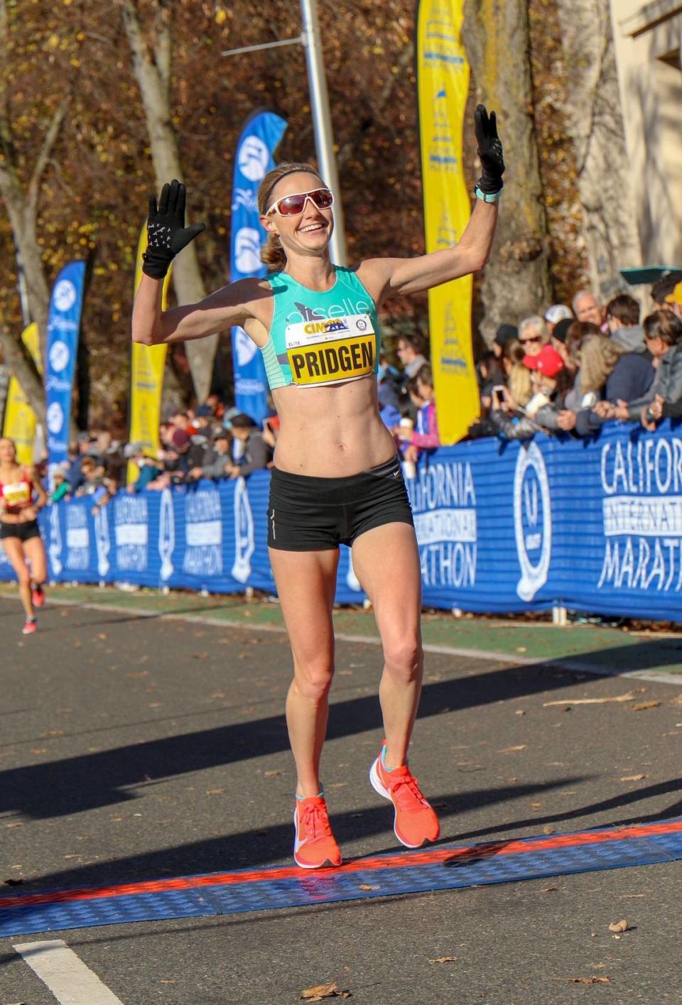 Paula Pridgen crosses the finish line at the California International Marathon in Sacramento to post her second Trials-qualifying time of 2018.