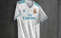 <p>Blue strips for Real Madrid? Really? </p>