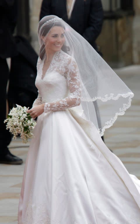 The Duchess of Cambridge in her Alexander McQueen wedding dress - Credit: Corbis