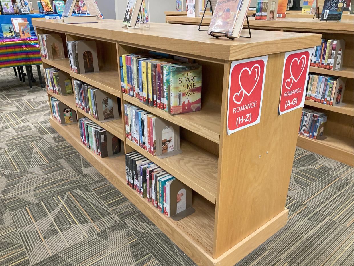 The romance section at the Hoover High School library will be one of many sections that could lose books because of a new Iowa law ordering the removal of any books depicting sex acts.