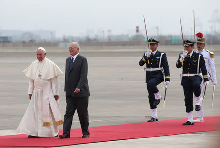 Pope Francis is greeted by Peru's President Pedro Pablo Kuczynski as he arrives in Lima, Peru, January 18, 2018. REUTERS/Alessandro Bianchi