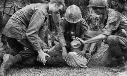 <b>Vietnam, 1968: A U.S. soldier questions an enemy suspect with the help of a waterboarding technique.</b> Photo Courtesy United Press International