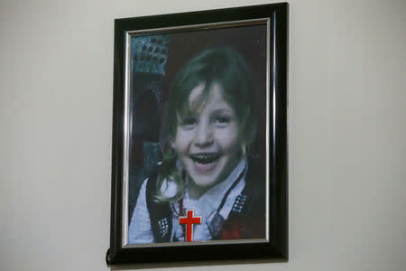 A picture of lost girl Christina Ezzo Abada is seen on the wall at a camp for refugee people in Erbil, Iraq, November 29, 2016. Picture taken November 29, 2016. REUTERS/Azad Lashkari