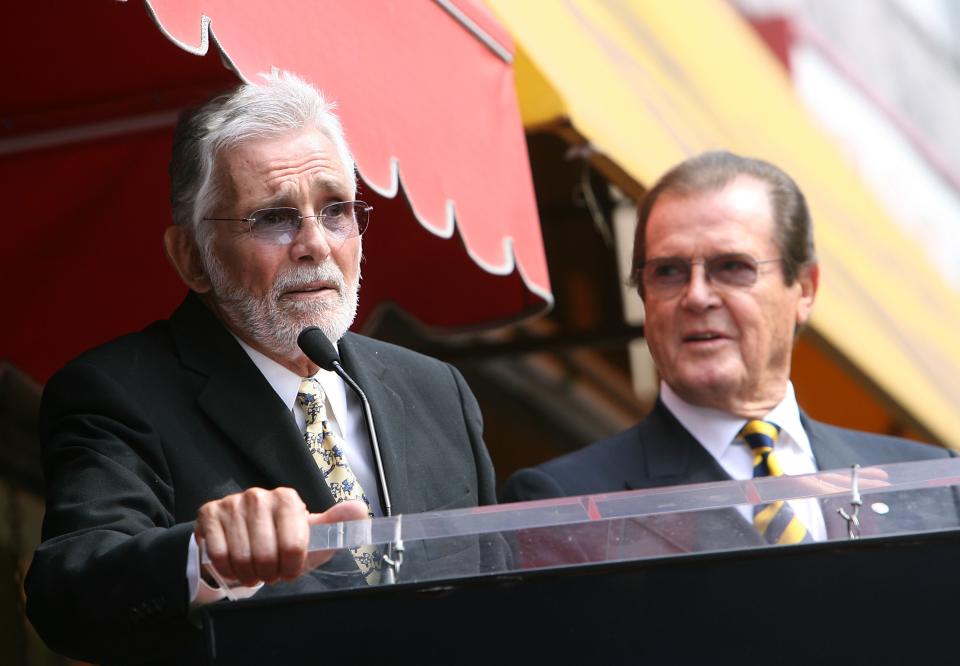 LOS ANGELES, CA - OCTOBER 11:  Director David Hedison (L) honors actor Sir Roger Moore with a Star on the Walk of Fame at 7007 Hollywood Blvd. on October 11, 2007 in Los Angeles, California.  (Photo by Michael Buckner/Getty Images)