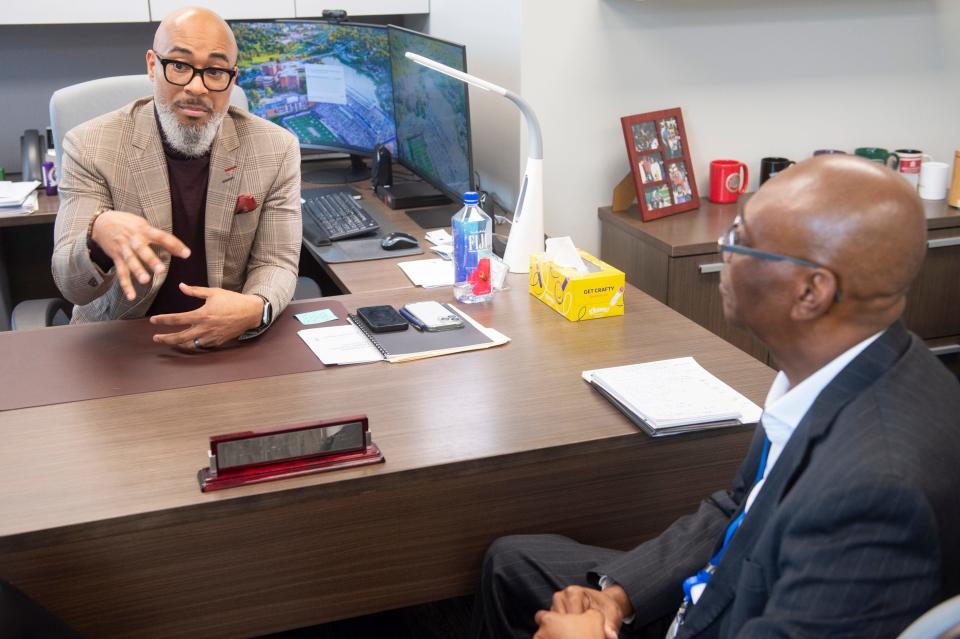 Montgomery Public Schools Superintendent Melvin Brown and Chief School Financial Officer Arthur Watts talk at MPS head office in Montgomery, Ala., on Wednesday, Feb. 21, 2024.